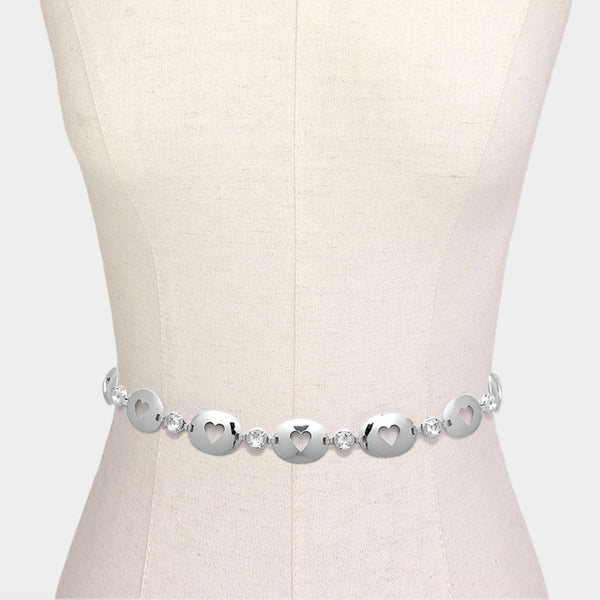 Cut Out Heart Chain Belt brings a touch of romance to any outfit. Crafted from high-quality materials, it showcases delicate heart-shaped cutouts and a chic chain design. Elevate your look with this versatile and stylish accessory. 