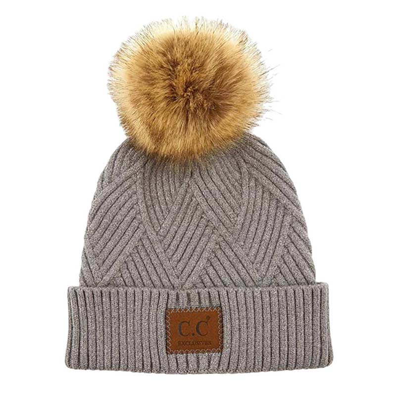 Dark Gray C.C Heather Beanie Hat With Pom Pom And Suede Patch, provides excellent protection and a fashionable look with its soft heather knit material, faux fur pom pom, and stylish suede patch. The fabric is designed to keep you comfortably warm in cold weather. Add this fashionable accessory to the winter wardrobe collection.