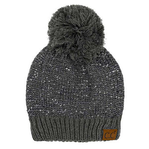 Dark Gray C.C Sequin Cuff Pom Pom Beanie Hat, Stay warm and stylish even during the coldest days with this. This hat is made with durable materials for long-lasting comfort and features a cozy and fashionable pom pom on the top. The added sequin cuff adds a glamorous touch to the classic beanie style. Perfect winter gift idea.