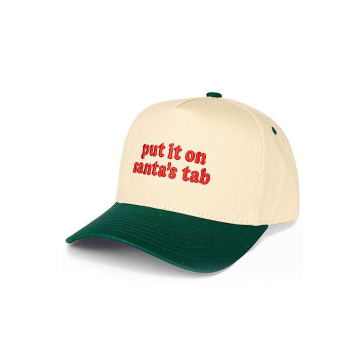 Bring holiday cheer wherever you go with the C.C “Put It On Santa’s Tab” Christmas Trucker Hat, crafted from 100% cotton for a soft, breathable feel. Featuring festive embroidered lettering and an adjustable snapback design, it’s the perfect playful accessory for celebrating the season in comfort and style.
