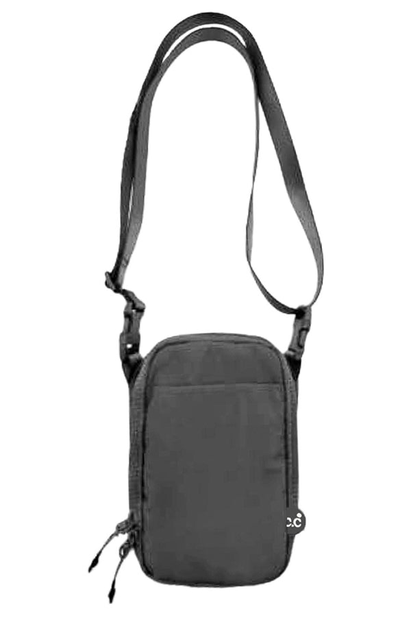Dark Gray C.C Small Solid Cross Body Sling Bag offers a compact and stylish solution for carrying essentials hands-free. Designed for convenience and comfort, its streamlined silhouette fits securely across the body, making it ideal for daily errands or travel. Crafted with durable materials, this sling bag ensures longevity while maintaining a sleek, minimalist look suitable for various occasions. 