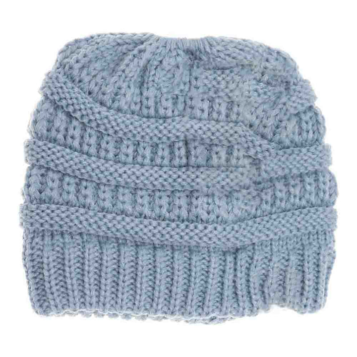 Denim Kids Solid Classic CC Beanie Tail combines timeless style with practical comfort. Designed with a soft, durable fabric, it provides warmth while allowing a ponytail or bun to fit through the open tail hole comfortably. Ideal for active children, this beanie ensures a secure and cozy fit during outdoor activities in cooler weather. Its solid color and classic design make it versatile for everyday wear or layering under helmets and hoods.