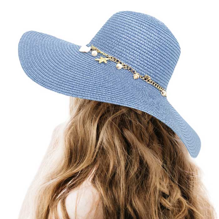 Denim Pearl Starfish Shell Charm Band Pointed Straw Sun Hat, is perfect for any beach or outdoor occasion. The beautifully crafted pearl and shell band adds a touch of glamour, while the pointed straw design provides ample shade and breathability. Stay stylish and protected from the sun with this must-have accessory. 