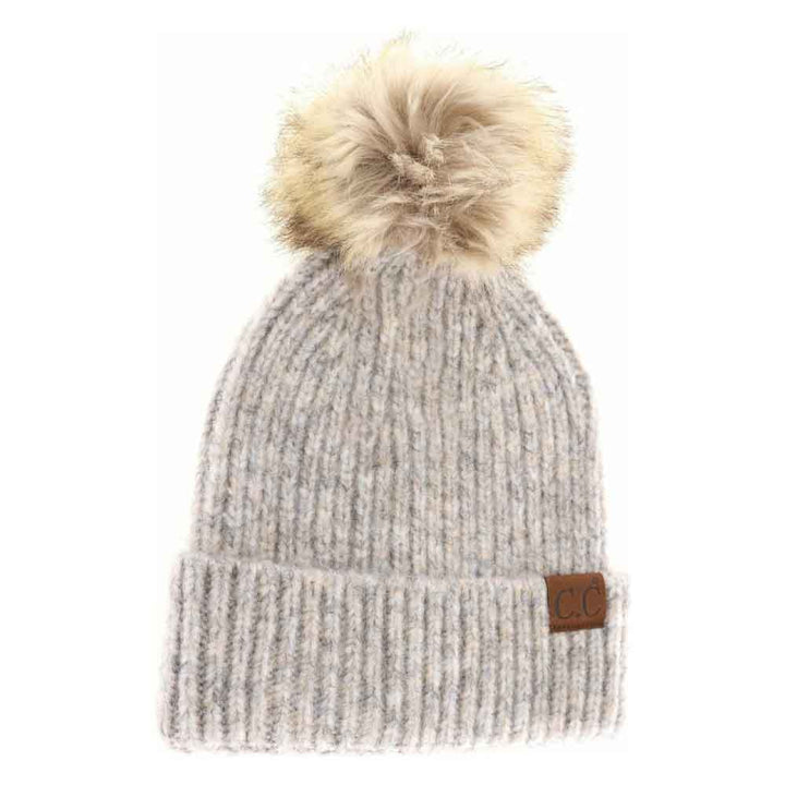 DoveMulti- Soft Ribbed Fur Pom C.C Beanie combines expert craftsmanship with functional warmth. Its soft ribbed knit fabric ensures a snug, comfortable fit while providing excellent insulation against the cold. Topped with a plush fur pom, this beanie adds a refined element to your winter wardrobe. Designed for durability and style, it’s an ideal accessory for professional and casual settings alike, offering reliable protection without compromising on appearance. 