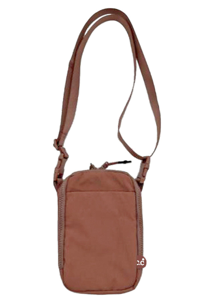 DustyMauve C.C Small Solid Cross Body Sling Bag is a stylish yet practical accessory for on-the-go individuals. With its compact size and durable design, it allows for hands-free carrying while keeping all your essentials within reach. Crafted with quality materials, it is a reliable and fashionable choice for any occasion.