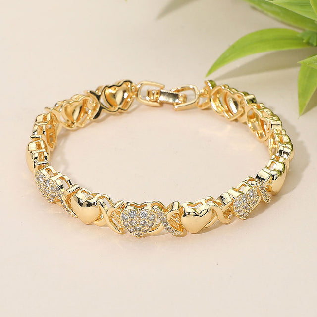 Madeline Love Gold CZ Stone Paved Heart Crisscross Link Bracelet