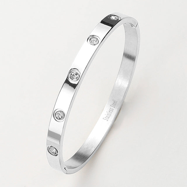 Madeline Love Silver Stainless Steel Crystal Embellished Bangle Bracelet - Bracelets