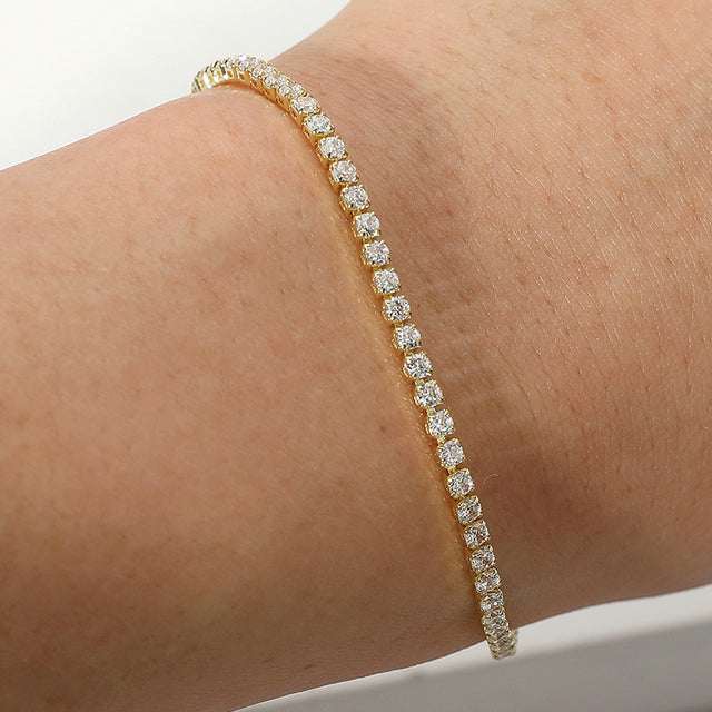 Madeline Love Clear, Gold Stainless Steel Round CZ Stone Tennis Chain Pull Tie Adjustable Bracelet