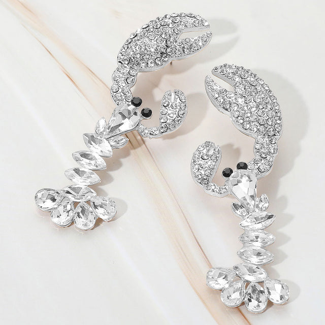 Madeline Love Clear, Rhodium Multi Stone Lobster Dangle Statement Earrings