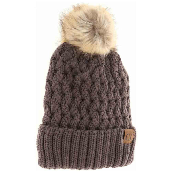 Earth-Grey- Solid Lattice Stitch Fur Pom CC Beanie features a meticulously crafted lattice stitch design that ensures exceptional warmth and durability. Topped with a soft, luxurious fur pom, this beanie combines functional insulation with sophisticated style. Its versatile solid color and expert construction make it an essential accessory for cold-weather protection while elevating your winter wardrobe.