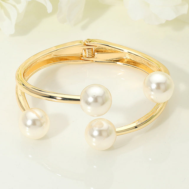 Madeline Love Cream, Gold Pearl Tip Hinged Bangle Bracelet - Bracelets