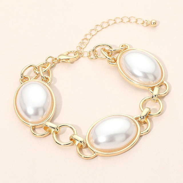 Madeline Love Cream, Gold Oval Pearl Cabochon Link Bracelet