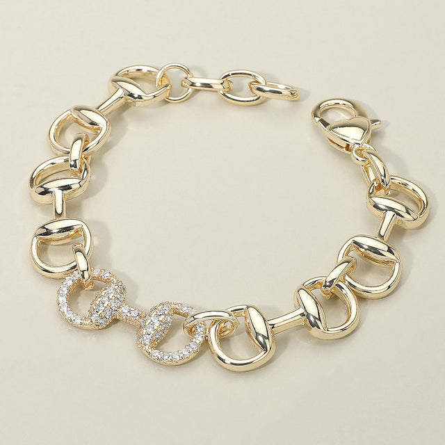 Madeline Love Gold 14K Gold Plated CZ Stone Paved Horsebit Center Accent Link Bracelet