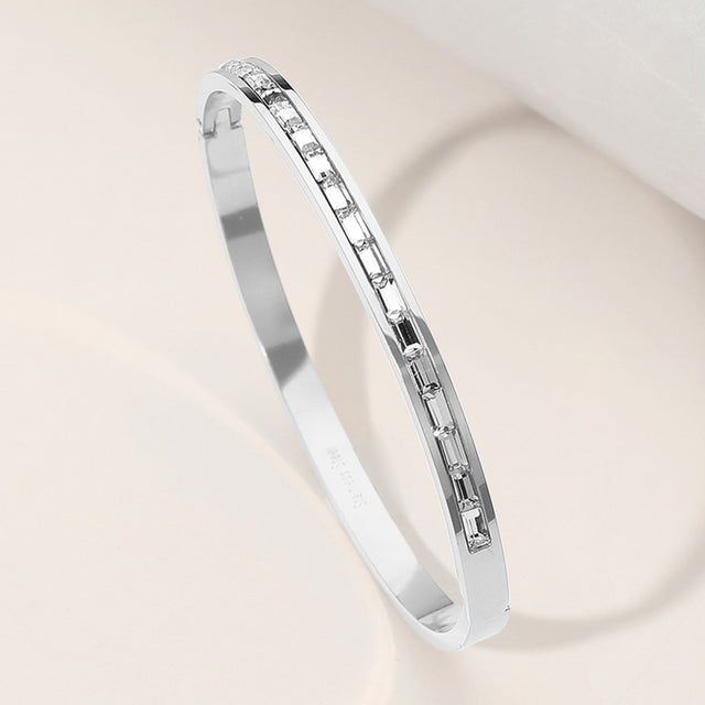 Madeline Love Clear, Silver Stainless Steel Baguette Stone Paved Hinged Bangle Bracelet - Bracelets