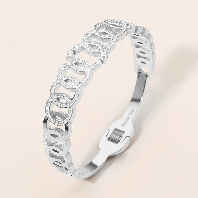 Madeline Love Silver Stainless Steel CZ Pave Circle Link Hinged Bangle Bracelet - Bracelets