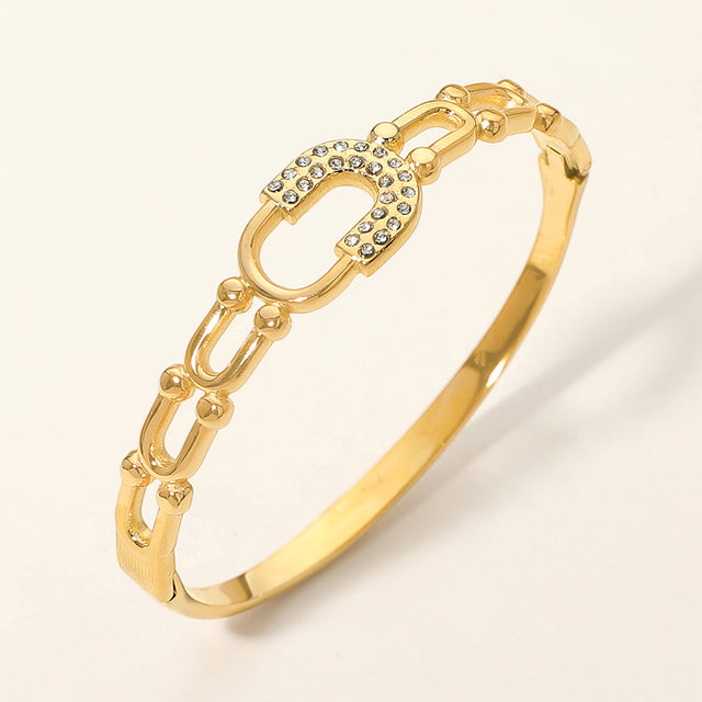Madeline Love Gold Stainless Steel CZ Pave Horseshoe Accent Hinged Bangle Bracelet - Bracelets