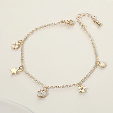 Madeline Love Clear, Gold Stone Paved Heart Star Clover Charm Station Bracelet - Bracelets