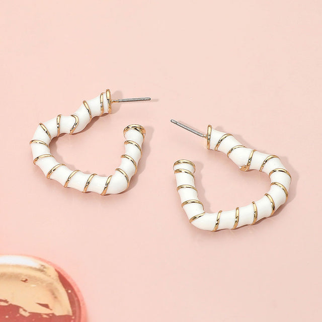 Madeline Love Gold, White Enamel Twisted Open Heart Hoop Earrings