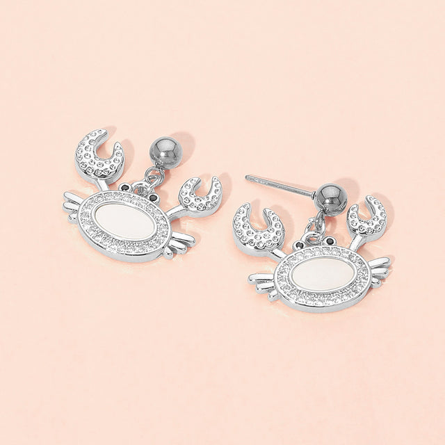 Madeline Love Mother of Pearl, Silver Stainless Steel Mother of Pearl CZ Stone Paved Crab Charm Dangle Earrings