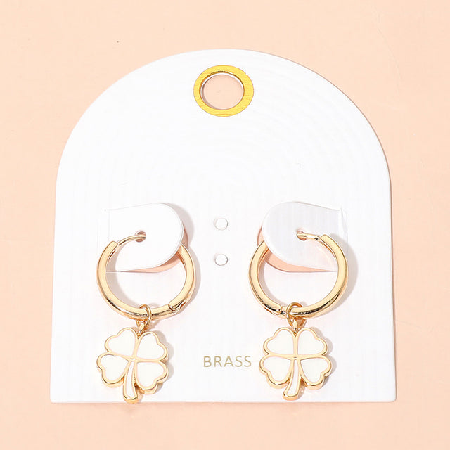 Madeline Love Gold, White Clover Charm Drop Mini Huggie Hoop Earrings