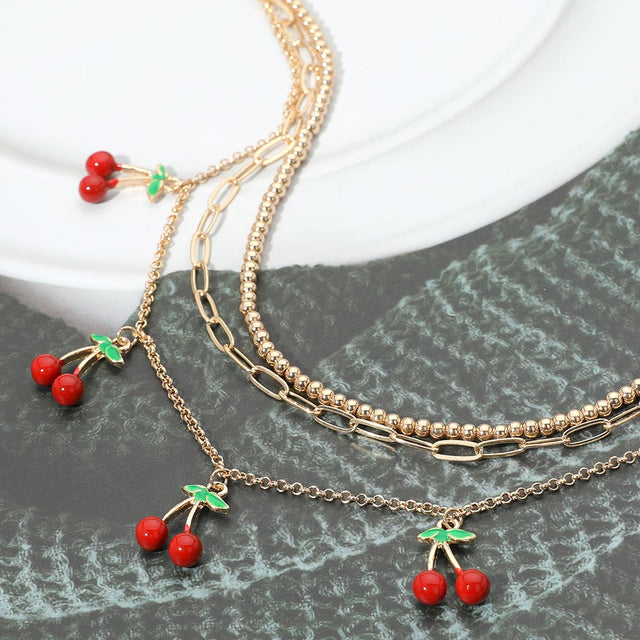 Madeline Love Gold Enamel Cherry Charm Station Layered Necklace - Necklaces