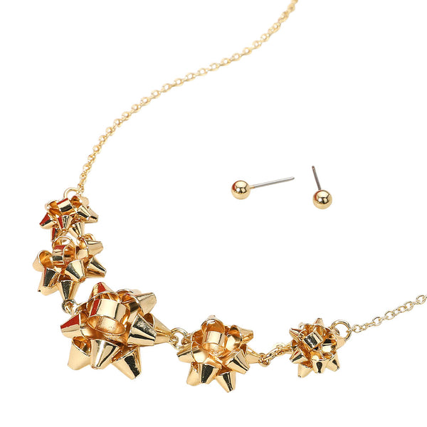 Charming necklace and earring set featuring playful bow-shaped accents and a delicate chain. A whimsical yet elegant design perfect for festive occasions or adding flair to everyday looks.