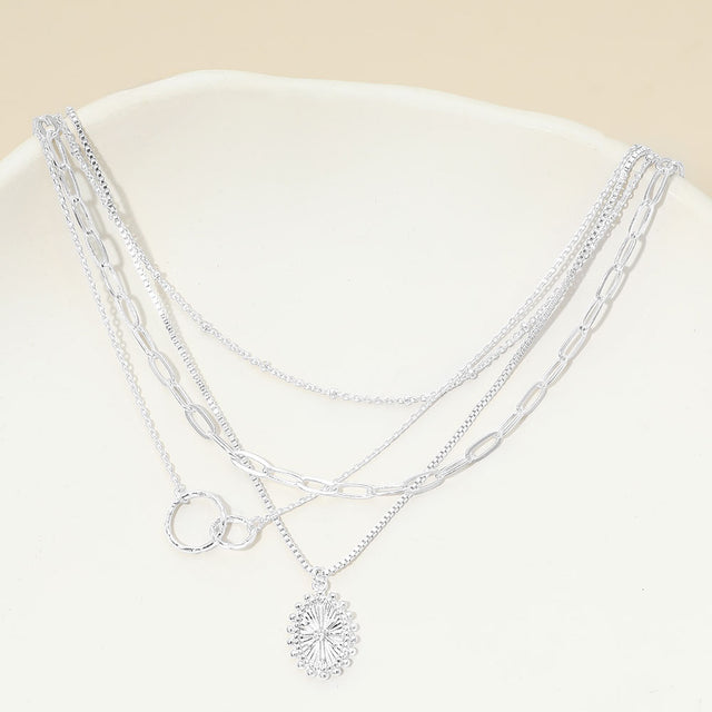 Madeline Love Clear, Silver, White Gold White Gold Dipped Oval Sunburst Charm Accent Mixed Chain Layered Necklace - Necklaces