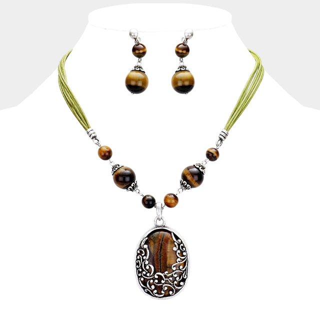 Madeline Love Brown, Green, Silver Burnished Oval Natural Stone Embossed Metal Pendant Necklace - Necklaces