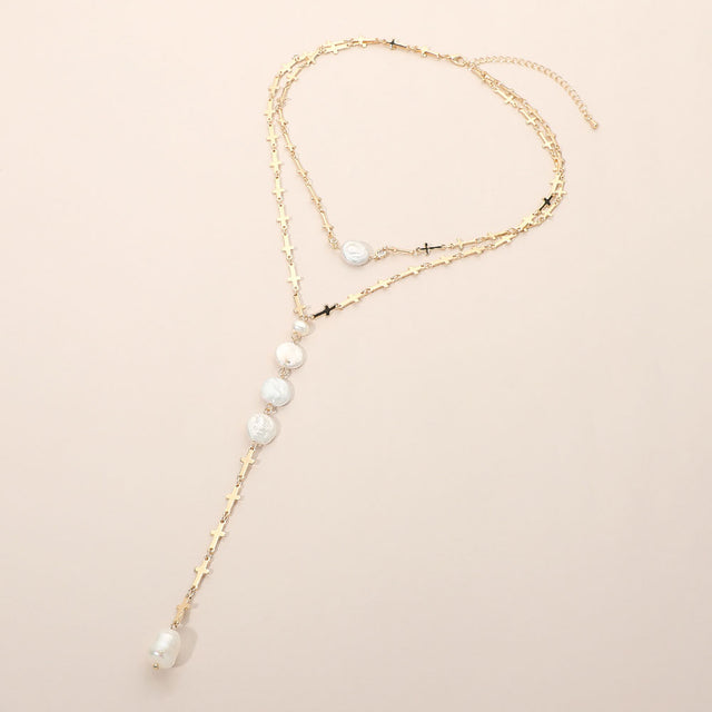 Madeline Love Cream, Gold Round Pearl Link Charm Drop Cross Link Chain Y Necklace