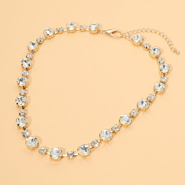 Madeline Love Clear, Gold Alternating Round Stone Link Statement Necklace