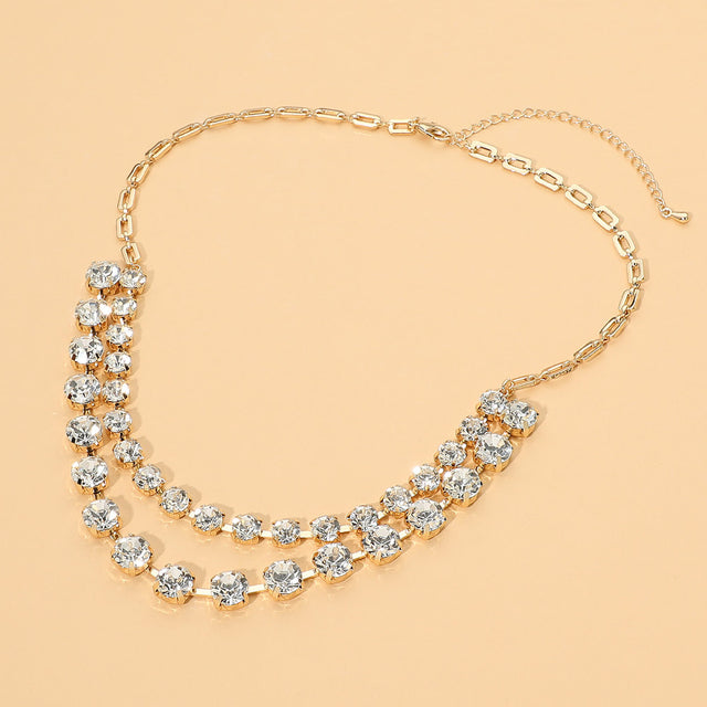 Madeline Love Clear, Gold Round Stone Layered Statement Necklace