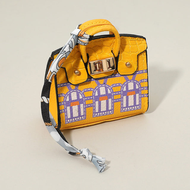 Madeline Love Yellow House Printed Faux Leather Elegant and Stylish Mini Purse Bag Charm - Bags & Wallets
