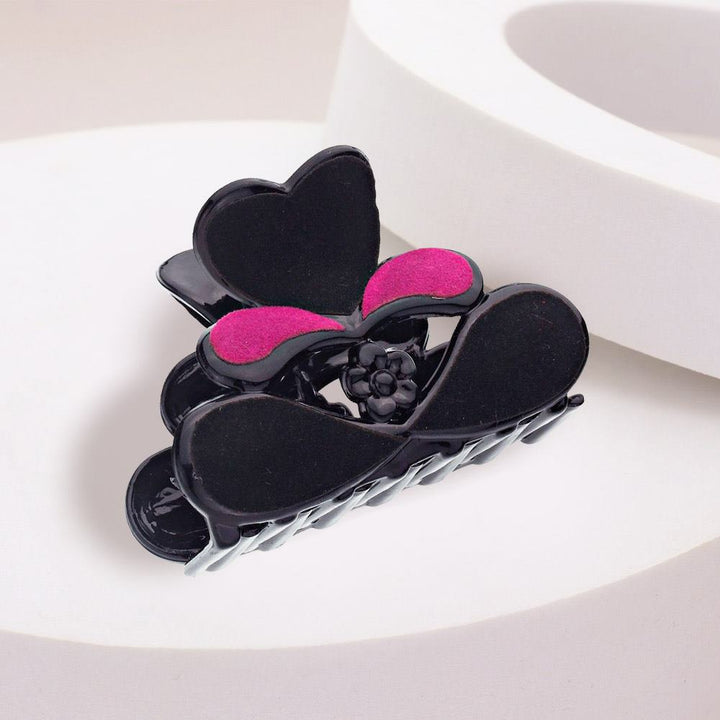 Felt Heart Hair Claw Clip is a must-have accessory for hair enthusiasts. Designed with a sturdy build and soft felt material, it securely holds hair in place while adding a touch of charm. It's ideal for any occasion and a stylish addition to elevate any hairstyle. 