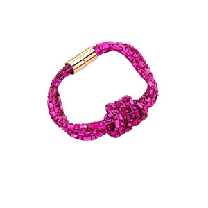 Fuchsia Bling Knot Magnetic Bracelet, enhance your attire with this beautiful bracelet to show off your fun trendsetting style. It can be worn with any daily wear such as shirts, dresses, T-shirts, etc. It's a perfect birthday gift, anniversary gift, Mother's Day gift, holiday getaway, or any other event.