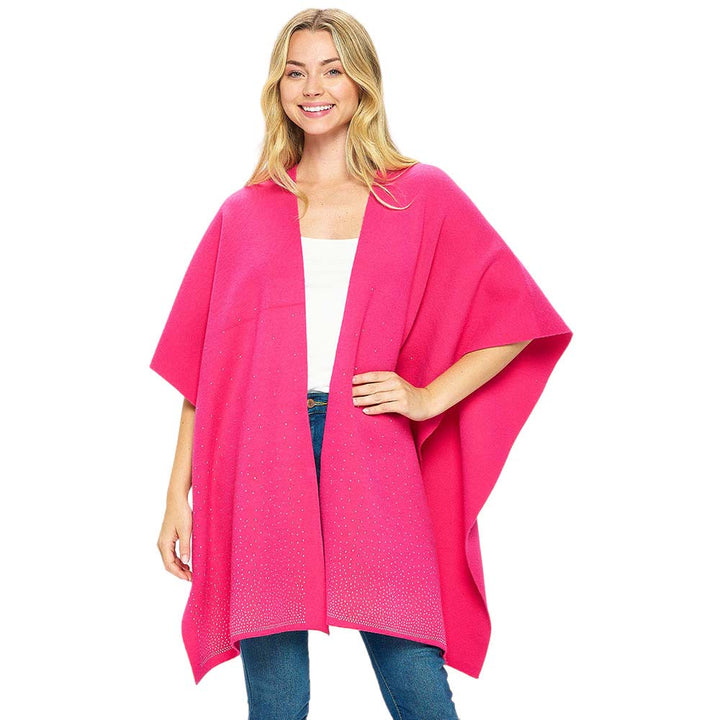 Fuchsia Bling Solid Ruana Poncho is a fashionable outfit. Crafted with a soft, luxurious  blend of 50% viscose, 25% nylon, and 25% polyester, this poncho provides a superior level of comfort and warmth. The one size fits all construction adds to its versatility. An essential piece for your wardrobe for winter season.