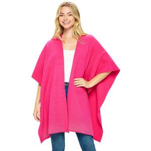 Fuchsia Bling Solid Ruana Poncho is a fashionable outfit. Crafted with a soft, luxurious  blend of 50% viscose, 25% nylon, and 25% polyester, this poncho provides a superior level of comfort and warmth. The one size fits all construction adds to its versatility. An essential piece for your wardrobe for winter season.