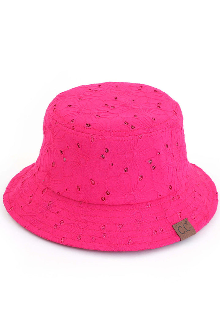 Fuchsia C.C EMBROIDERED FLORAL COTTON EYELET HAT is made of high-quality cotton and features beautiful embroidered floral details. Perfect for adding a touch of elegance and style to any outfit. The lightweight and breathable fabric provide comfort and protection from the sun.