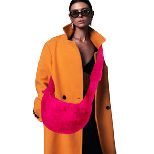 Fuchsia Faux Fur Fuzzy Plush Crossbody Bag, is a stylish accessory for any wardrobe. Made of ultra-soft, faux fur, this bag is luxurious and comfortable to wear. Its adjustable strap and lightweight design make it easy to take on the go. Perfect for formal occasions or work meetings. Perfect gift choice for fashion lovers.