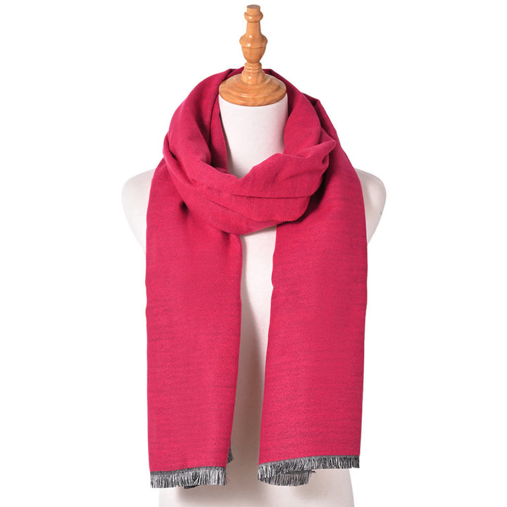 Fuchsia Reversible Frayed Oblong Scarf, Wrap yourself in style and warmth with this beautiful scarf. Crafted with sumptuous, lightweight fabric, this versatile scarf can be worn in two ways. A perfect winter accessory for wardrobe staples makes it perfect for gifting as a winter gift to any close person or treating yourself.