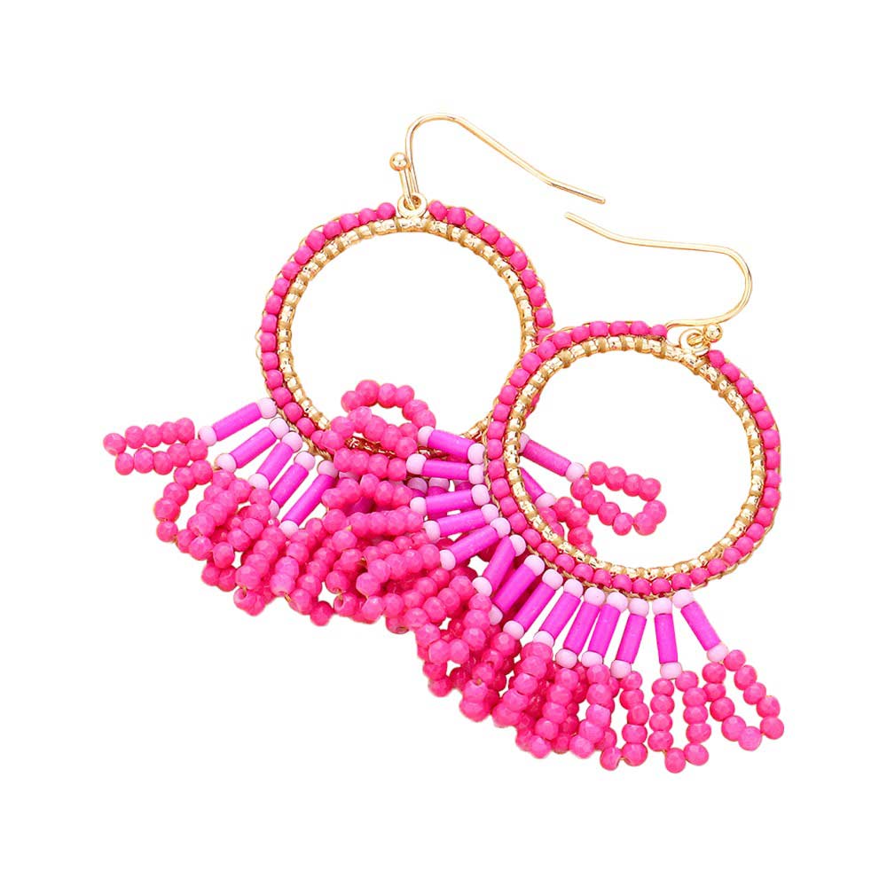 Fuchsia Seed Beaded Fringe Metallic Tiered Circle Dangle Earrings, Inject some drama into your look with these stunning pieces. Crafted with layers of tiny seed beads and metallic circles, these beautiful earrings provide a unique and eye-catching addition to any outfit. A perfect accessory for any occasion.