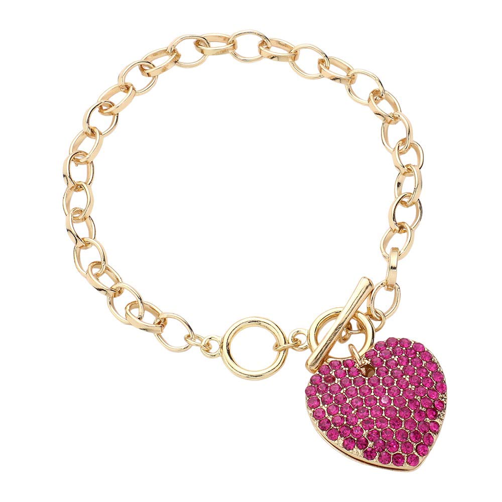 Fuchsia Stone Paved Heart Pendant Metal Toggle Bracelet, is a must-have accessory for any fashion-forward individual. Exquisitely crafted to elevate any outfit, this bracelet is a unique addition to your jewelry collection. Its toggle closure ensures a secure fit and its elegant style will make you stand out from the crowd.