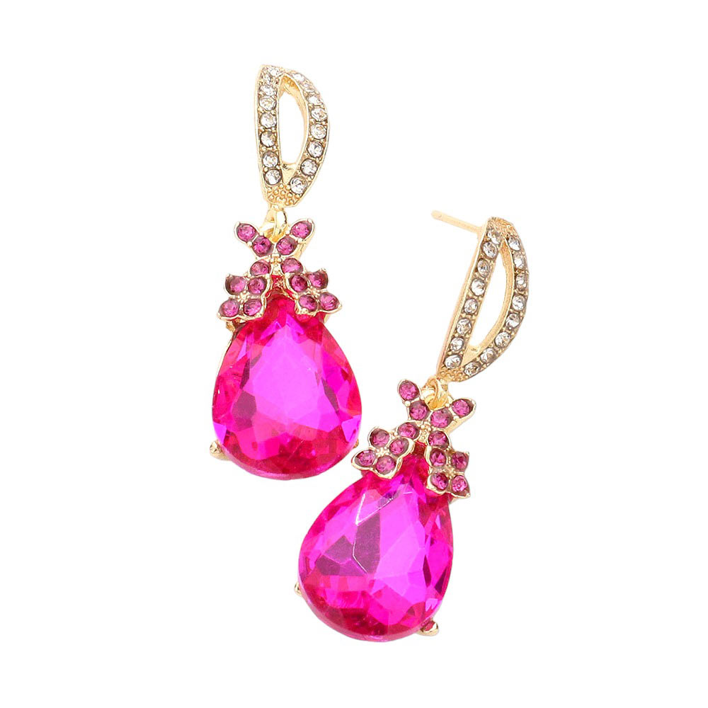 Fuchsia Teardrop Crystal Rhinestone Evening Earrings, are the perfect accessory for any special occasion. Each earring features a teardrop-shaped crystal encrusted in rhinestones for a glamorous sparkle and shine. High-quality stones are set securely in the design. A timeless gift piece that will sparkle for years.