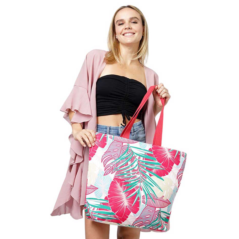Fuchsia Tropical Leaf Print Tote Bag, This stylish tote bag features a vibrant tropical leaf print, perfect for adding a touch of nature to your outfit. Made of durable material, it is great for carrying all your daily essentials while remaining lightweight. Bring a touch of the tropics wherever you go with this versatile tote