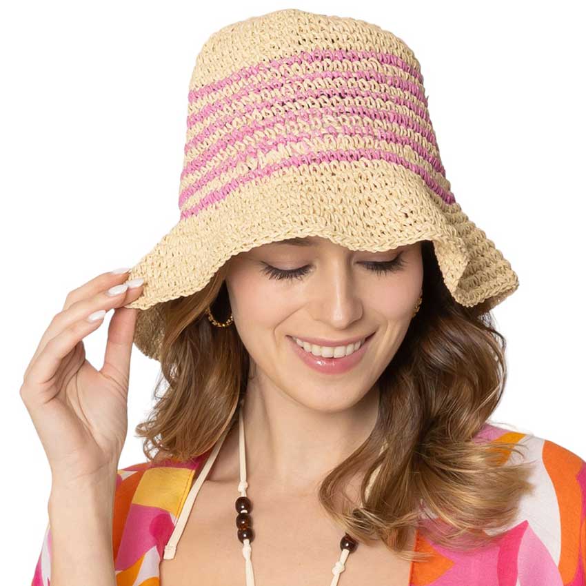 Fuchsia Two-Tone Stripe Straw Bucket Hat, Stay cool and stylish with the stylish summer hat. This quirky hat features a unique two-tone stripe design that adds a touch of fun to any outfit. Keep the sun out of your eyes while adding a playful flair to your look. Perfect for a day at the beach or a casual outing.