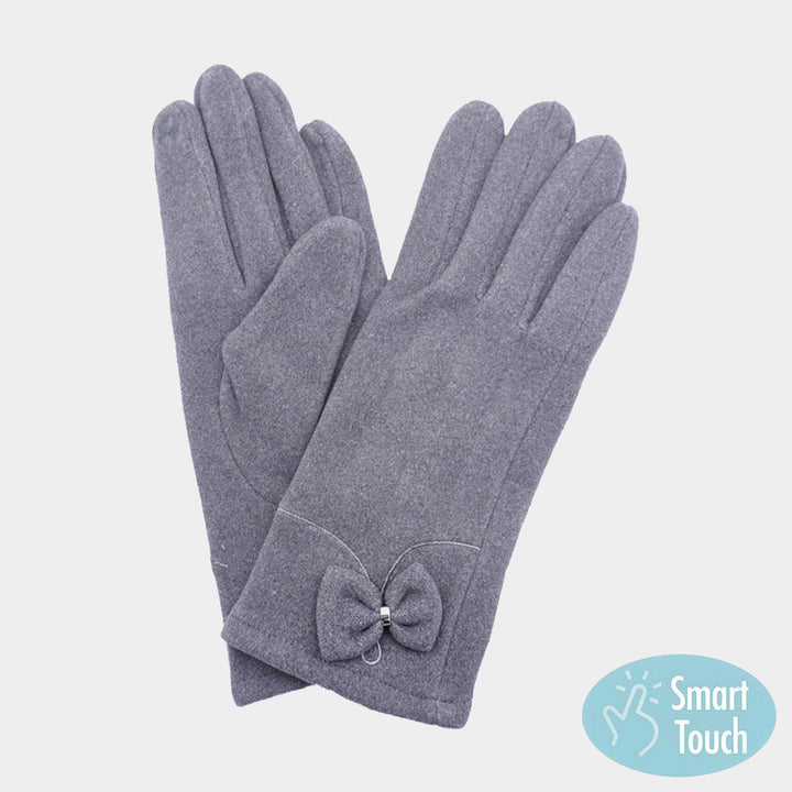 Elevate your winter style with our Bow Pointed Faux Suede Smart Touch Gloves. Crafted for the modern woman on the go, these gloves blend fashion and function flawlessly. The chic bow detail adds a touch of femininity, while the smart touch technology keeps you connected. Perfect for daily wear or as a thoughtful gift for a loved one. Stay stylish and connected all season long!