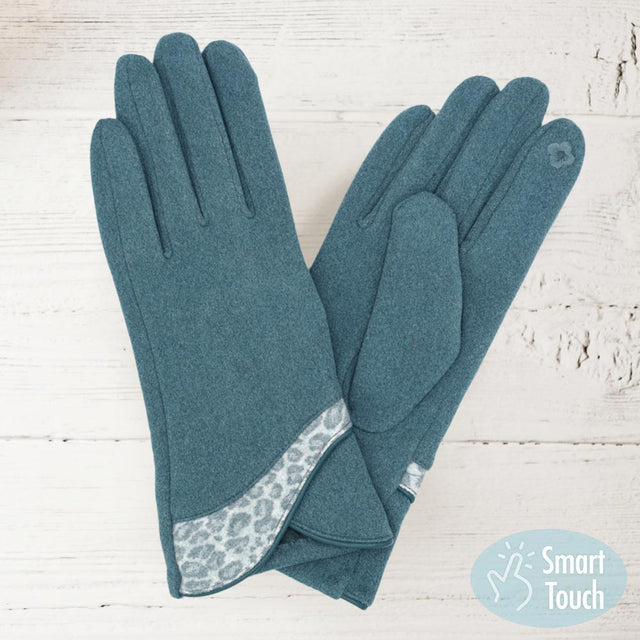 Blue Elevate your winter style with our Leopard Print Smart Gloves. Luxuriously soft with a fierce touch, these gloves blend fashion and function seamlessly. The chic leopard print adds a playful twist to your outfit, while the smart fingertips keep you connected on the go. Stay stylish and cozy, whether running errands or meeting friends for coffee. A perfect gift for the fashion-forward woman in your life. Glam up your winter wardrobe today!