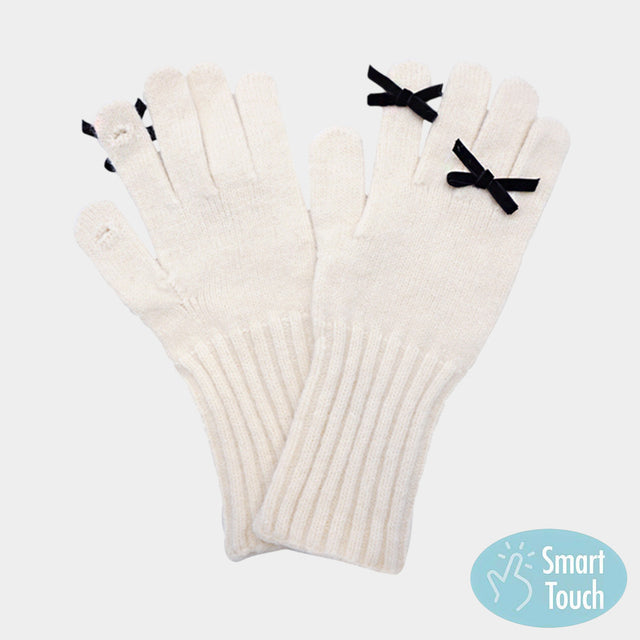 Beige Chic knit gloves with ribbed cuffs and charming bow accents, designed with smart touch technology for easy phone and tablet use. A stylish blend of warmth and functionality, these winter gloves add a feminine touch to cold-weather outfits while ensuring comfort and everyday practicality.