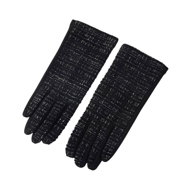 Black Modern winter gloves featuring a refined textured design and touchscreen-friendly fingertips for everyday convenience. Designed to complement seasonal outfits while maintaining practicality, these gloves are ideal for boutique assortments, cold-weather displays, and stylish functional accessory collections.
