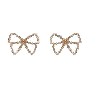 Gold Pearl Paved Bow Stud Earrings, Elevate your accessories with our exquisite earrings. With expertly paved pearls encircling a delicate bow design, these earrings add a touch of sophistication to any outfit. Perfect for any occasion, our earrings boast a timeless elegance that will never go out of style.