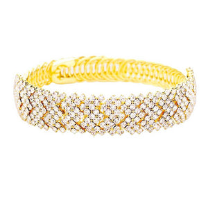 Gold Rhinestone Pave Adjustable Evening Bracelet, this chick bracelet features a classic design with sparkling rhinestone pave, perfect for formal occasions. The adjustable band allows for the perfect fit and can be easily adjusted for a comfortable wear. An elegant addition to any formal wardrobe.